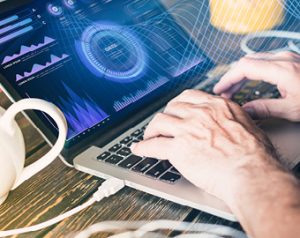 Image of Fleet Manager on a computer. The screen is showing reporting.